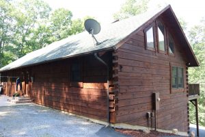 beautiful log home with new stain