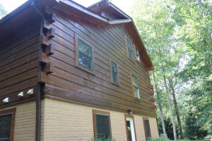 brand new stain job on log home